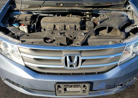 2012 Honda Odyssey Exl z USA, uszkodzony, nr VIN 5FNRL5H64CB090022